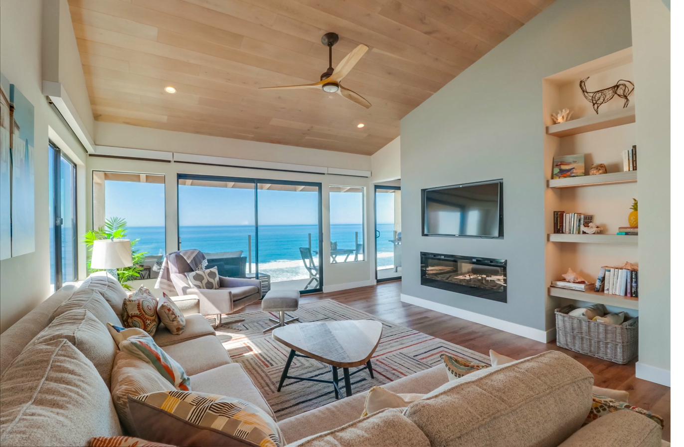 Living room of an Open Road Stays managed home with ocean views